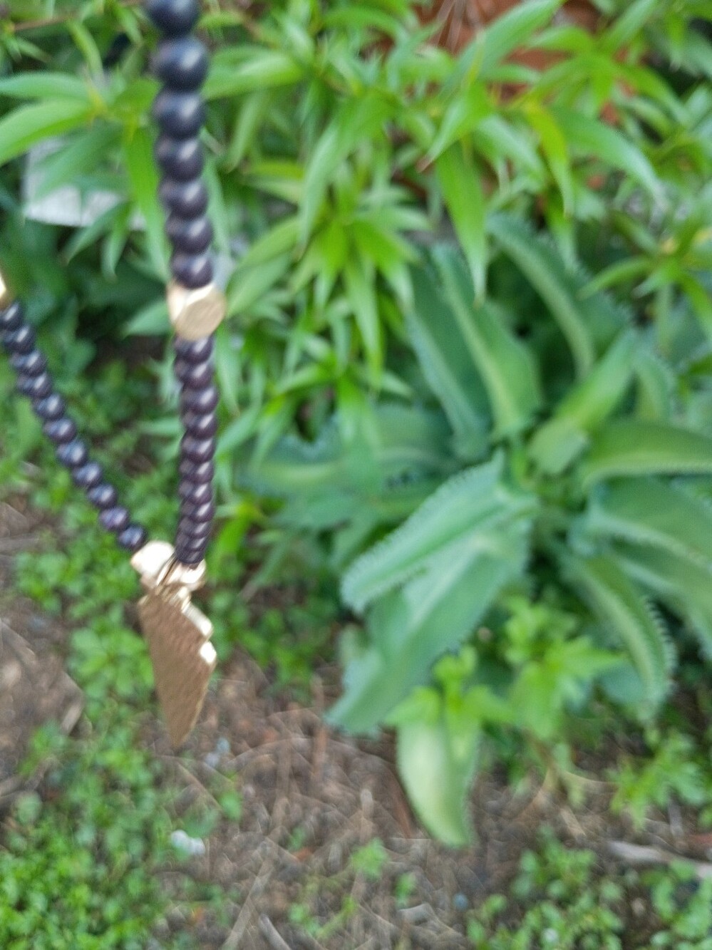 Gold Tone Arrowhead Pendant Necklace with Black Beads